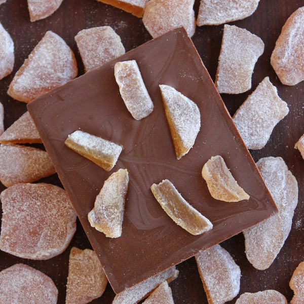 Dried candied ginger on milk chocolate